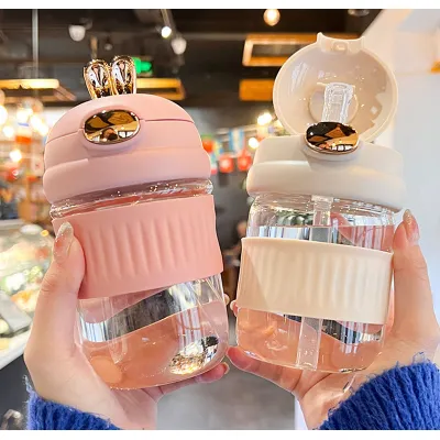 bình nước thuỷ tinh bọc silicon hình tai thỏ có nút bấm 400ml bình nước thuỷ tinh bọc silicon hình tai thỏ có nút bấm 400ml