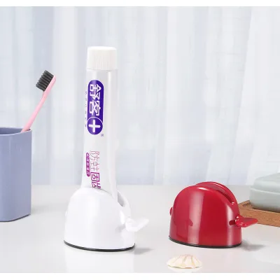 đồ dùng phòng tắm | dụng cụ kẹp kem đánh răng dạng xoay 360 độ đồ dùng phòng tắm | dụng cụ kẹp kem đánh răng dạng xoay 360 độ
