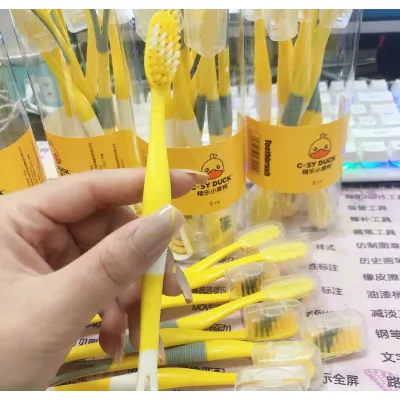 hộp 8 bàn chải đánh răng hình vịt vàng có đầu cạo lưỡi hộp 8 bàn chải đánh răng hình vịt vàng có đầu cạo lưỡi