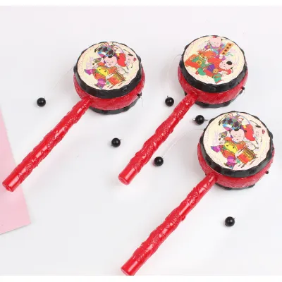 trống lắc tay lục lạc cho bé